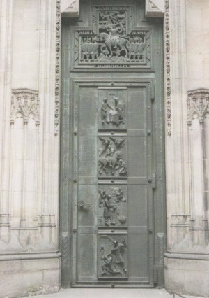 Doors showing a relief of the story of the Knights of Blanik mountain